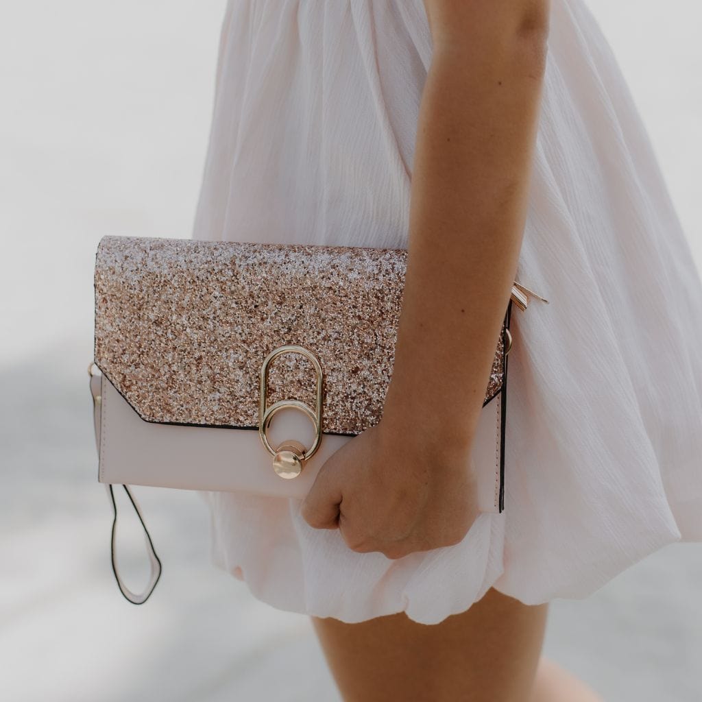 by JoAnn Clutch Handtasche mit Glitzer in Rosa