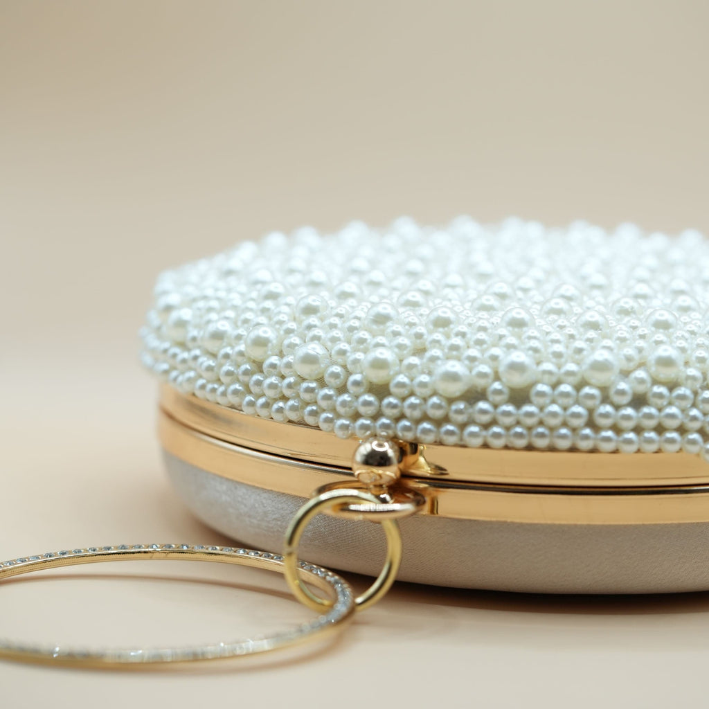by JoAnn Clutch Handtasche mit champagnerfarbenen Perlen