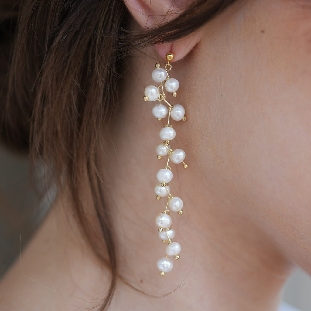 by JoAnn Ohrringe Ohrringe lang mit weißen oder lila/rosa Perlen
